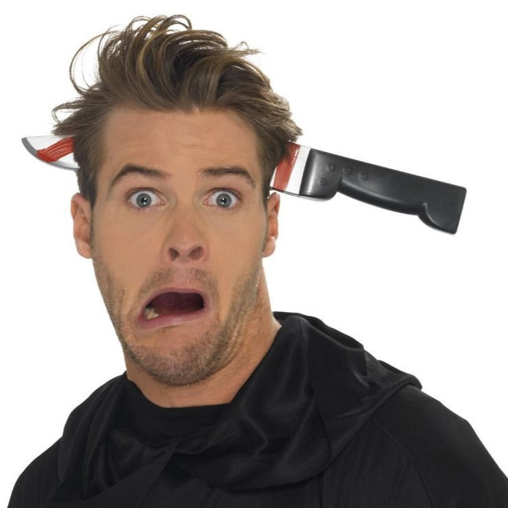 Plastic knife through head attaches with a headband 
