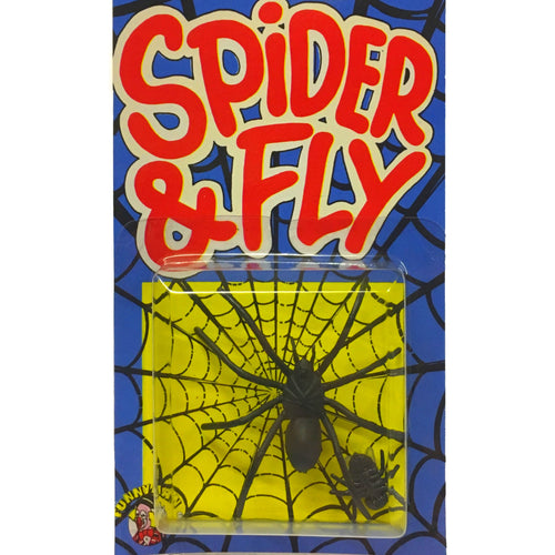 Realistic plastic spider and fly. 